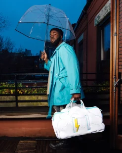 CLOUDY WITH A CHANCE OF SHARK DUFFLE